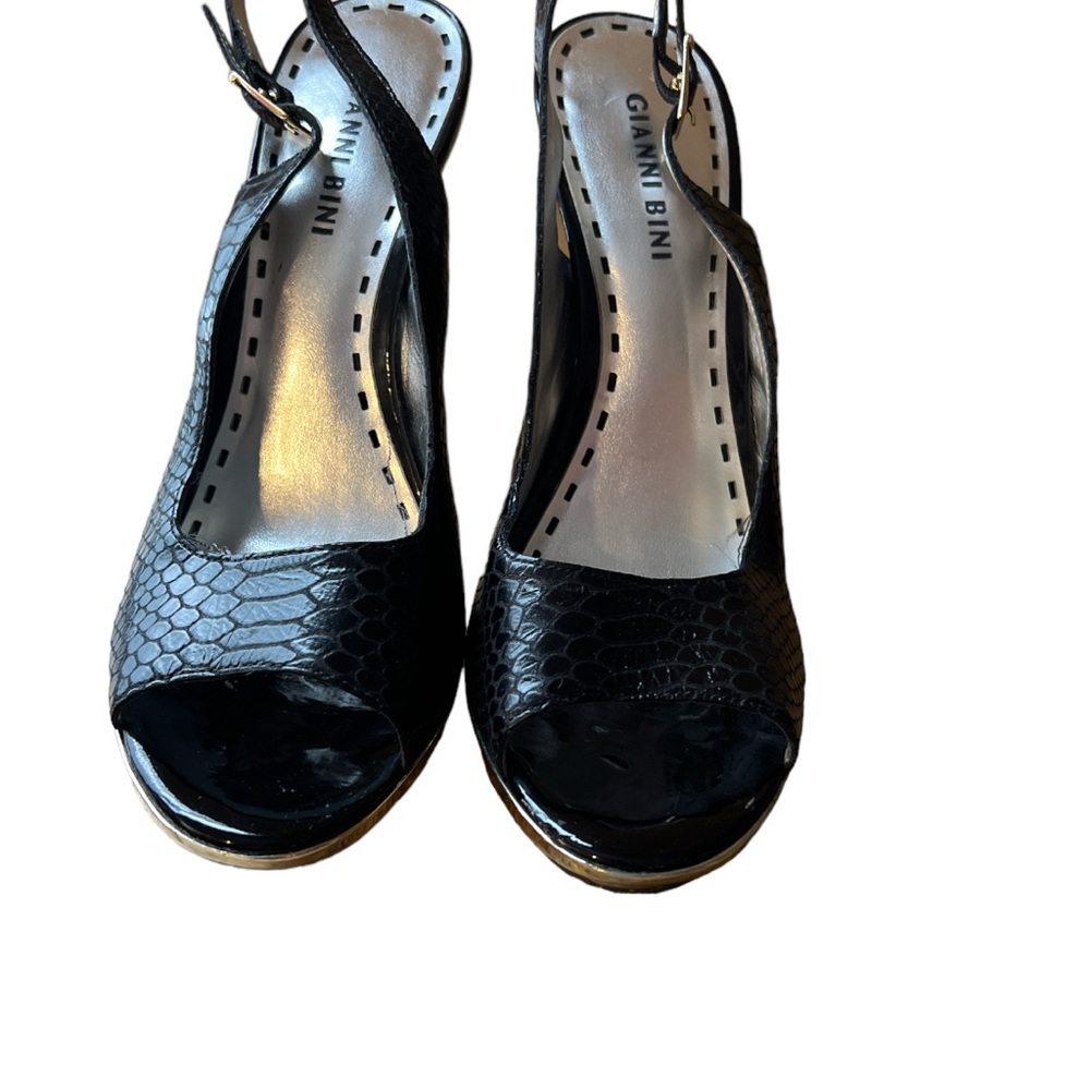 Gianni Bini black snake print platform heels.